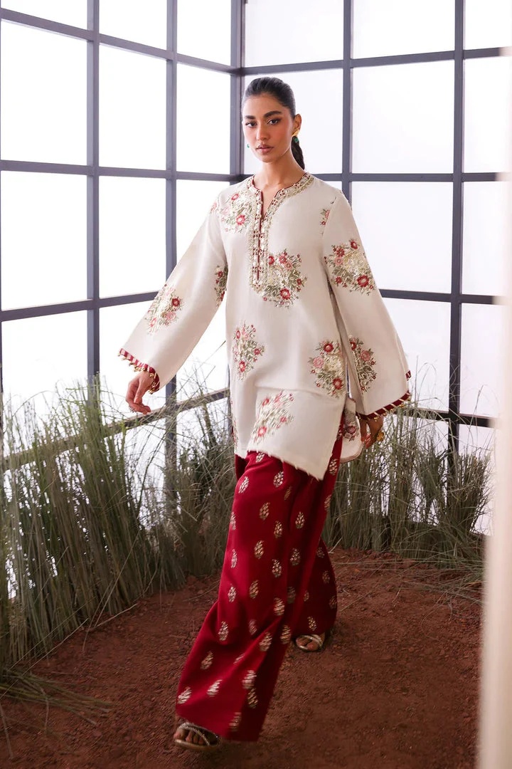 Ethnc - Off White pakistani fashion outfit in white, maroon tones.